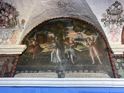 Acceso al Claustro de los Naranjos – Pinturas en la galería del Convento de Santa Catalina de Siena en Arequipa, Perú